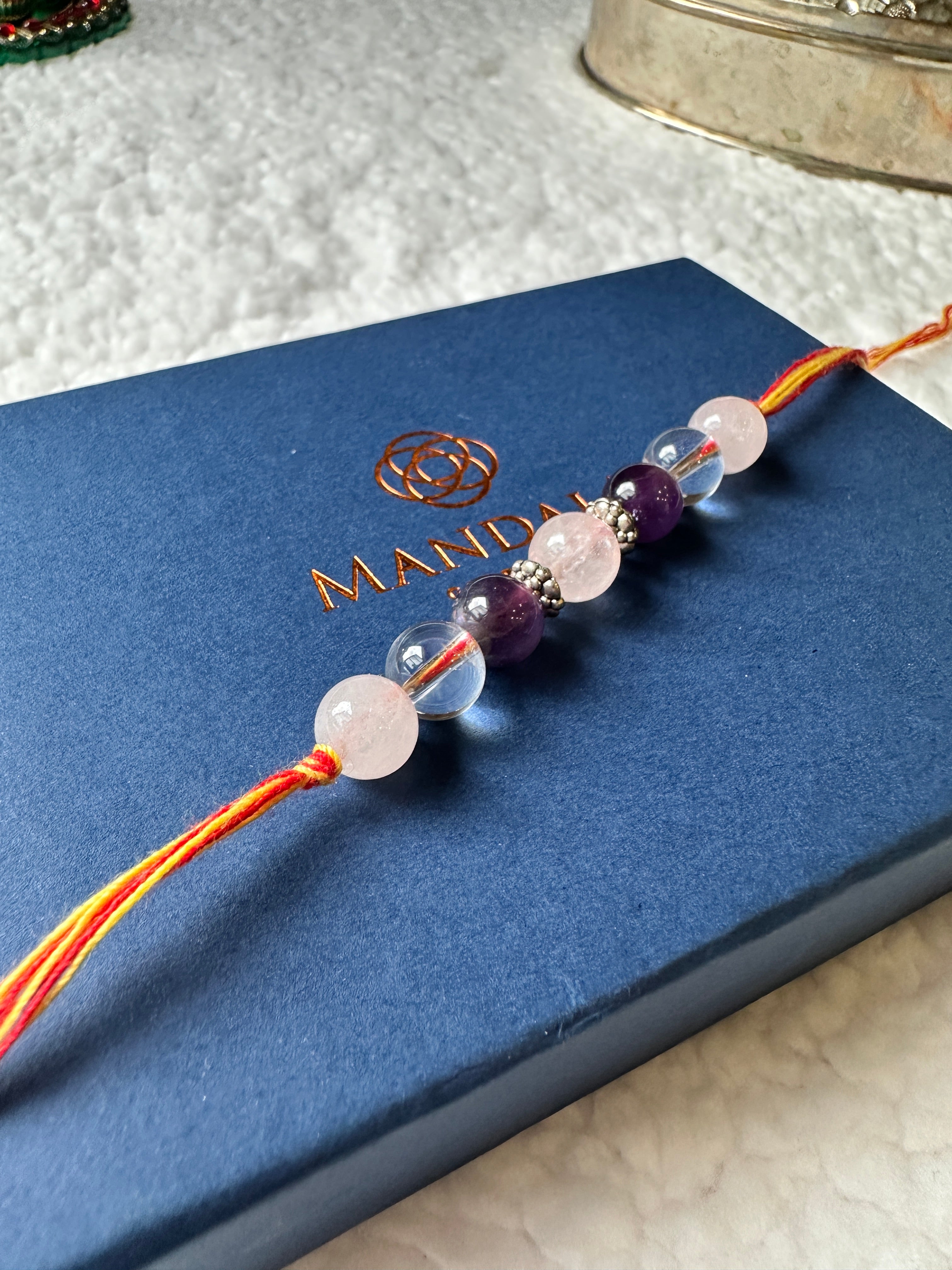 Trinity Crystal Rakhi – Rose Quartz, Amethyst & Clear Quartz for Love, Protection & Clarity