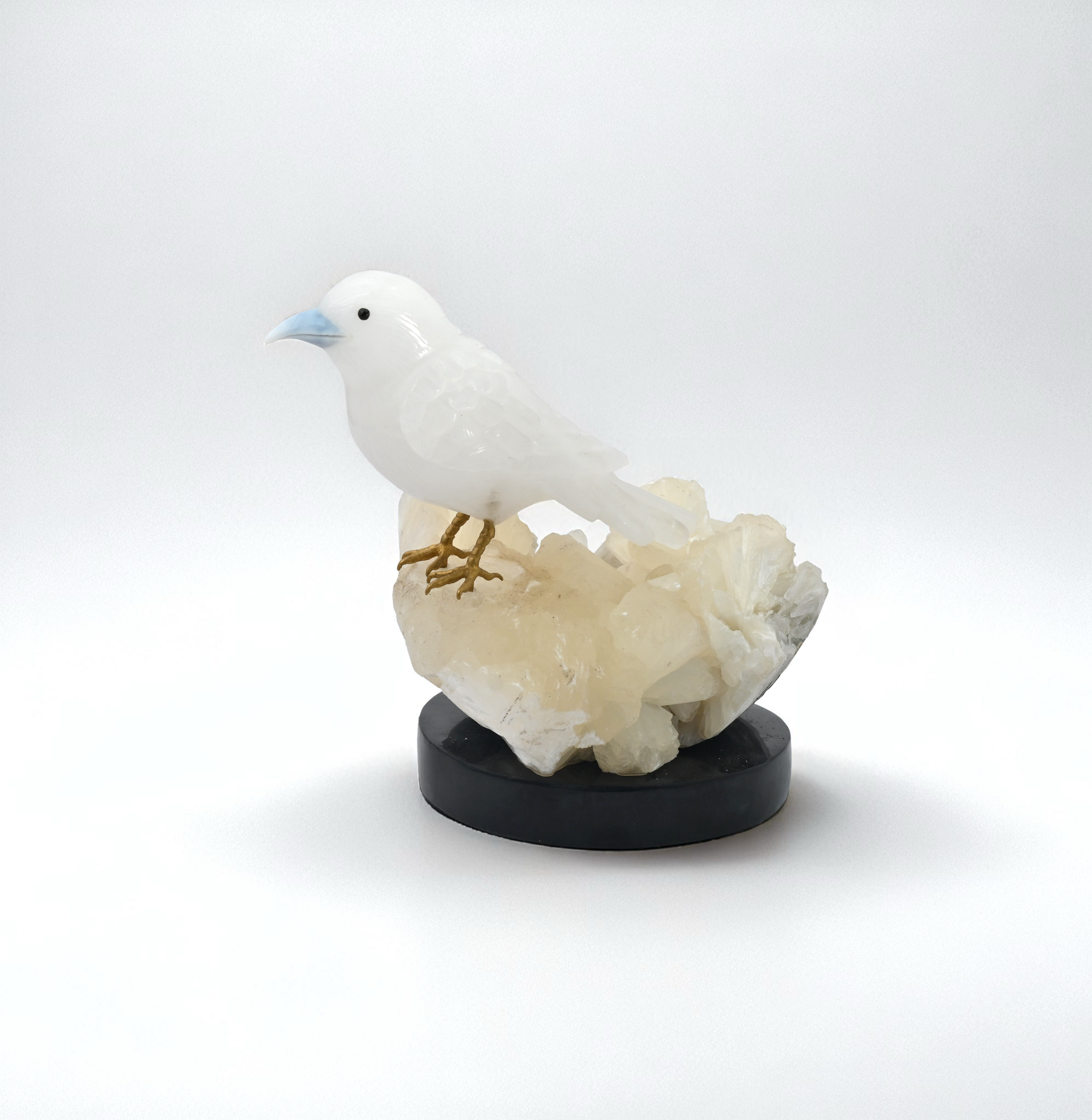 White Quartz Bird Sculpture on Crystal Rock