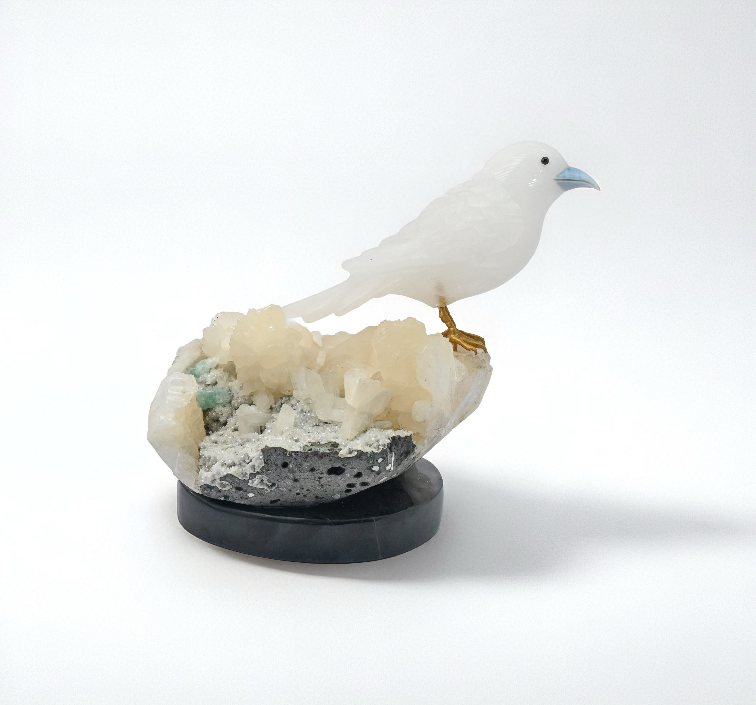 White Quartz Bird Sculpture on Crystal Rock