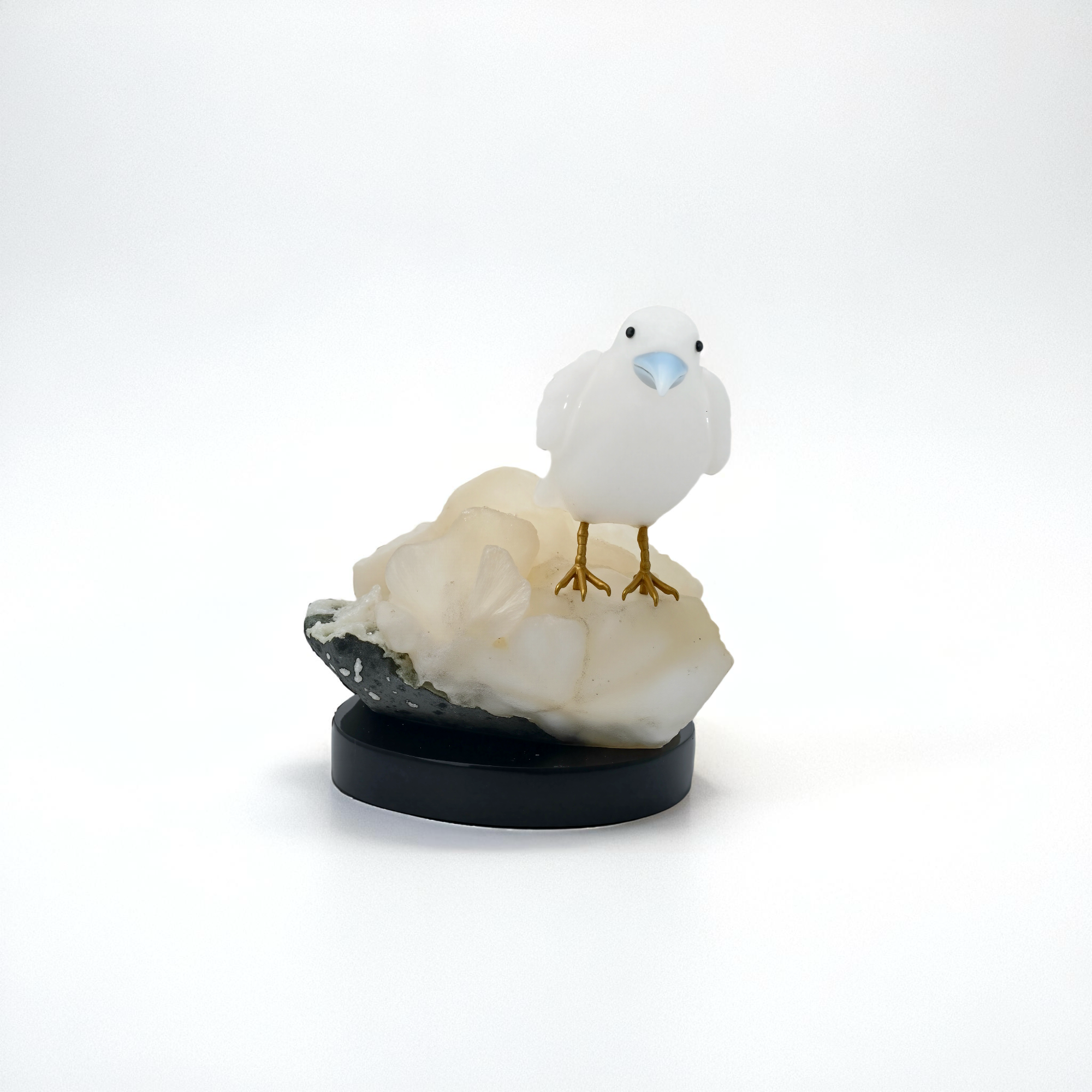 White Quartz Bird Sculpture on Crystal Rock