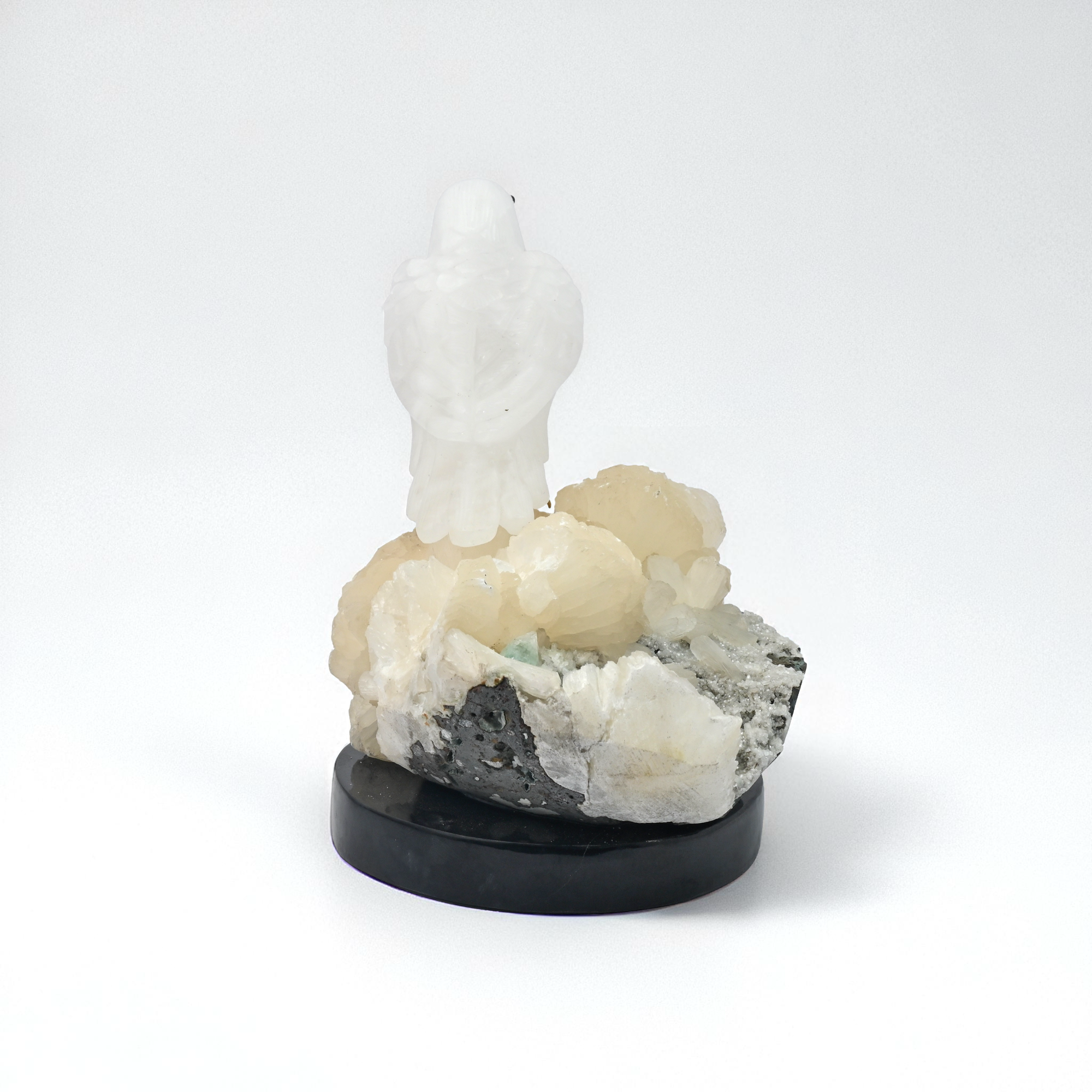 White Quartz Bird Sculpture on Crystal Rock