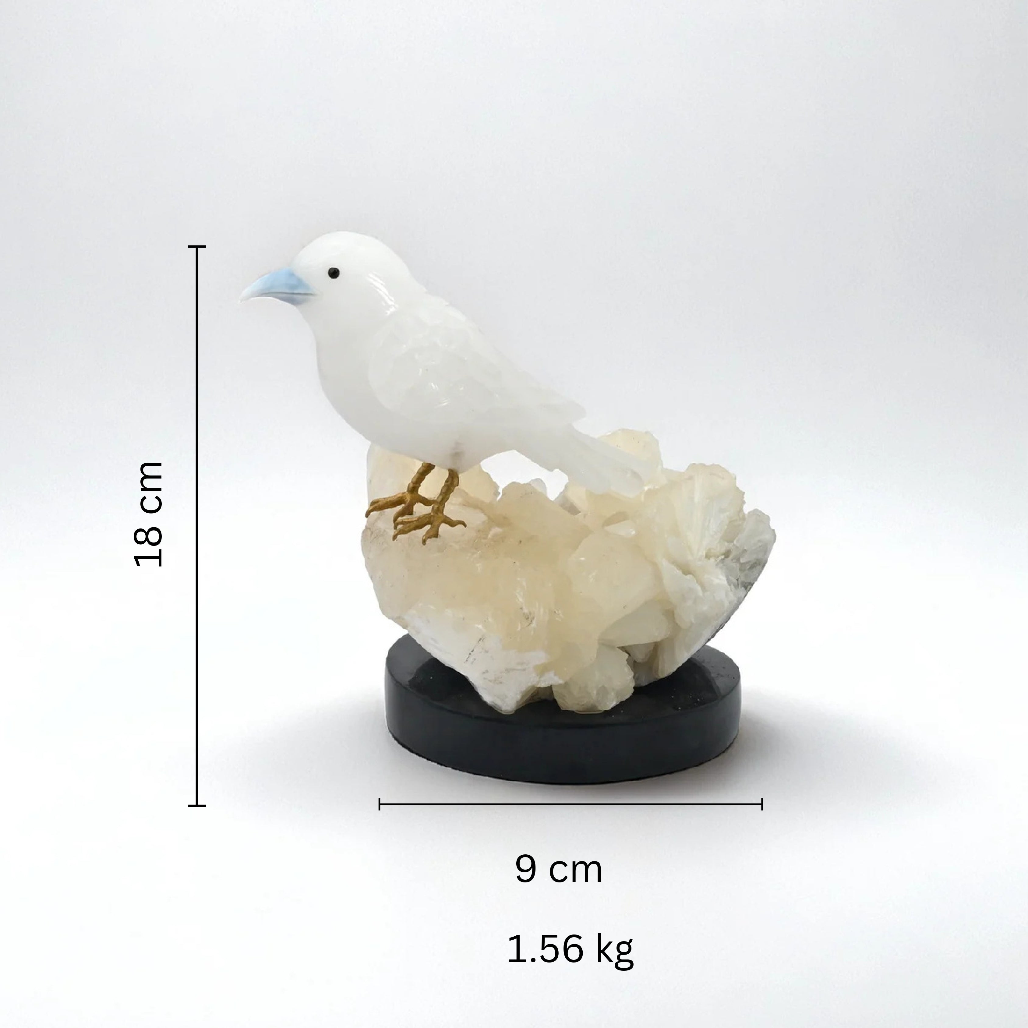 White Quartz Bird Sculpture on Crystal Rock