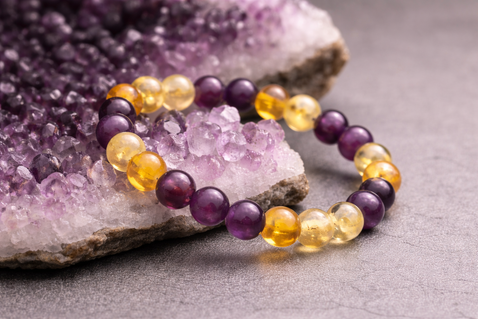 Bracelet activation ritual with sage, candle and moonstones