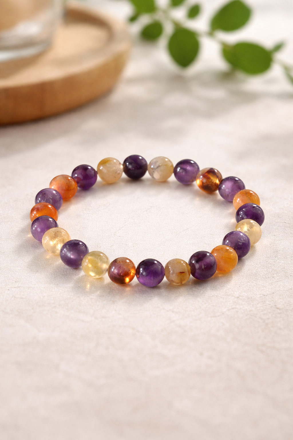 Bracelet activation ritual with sage, candle and moonstones