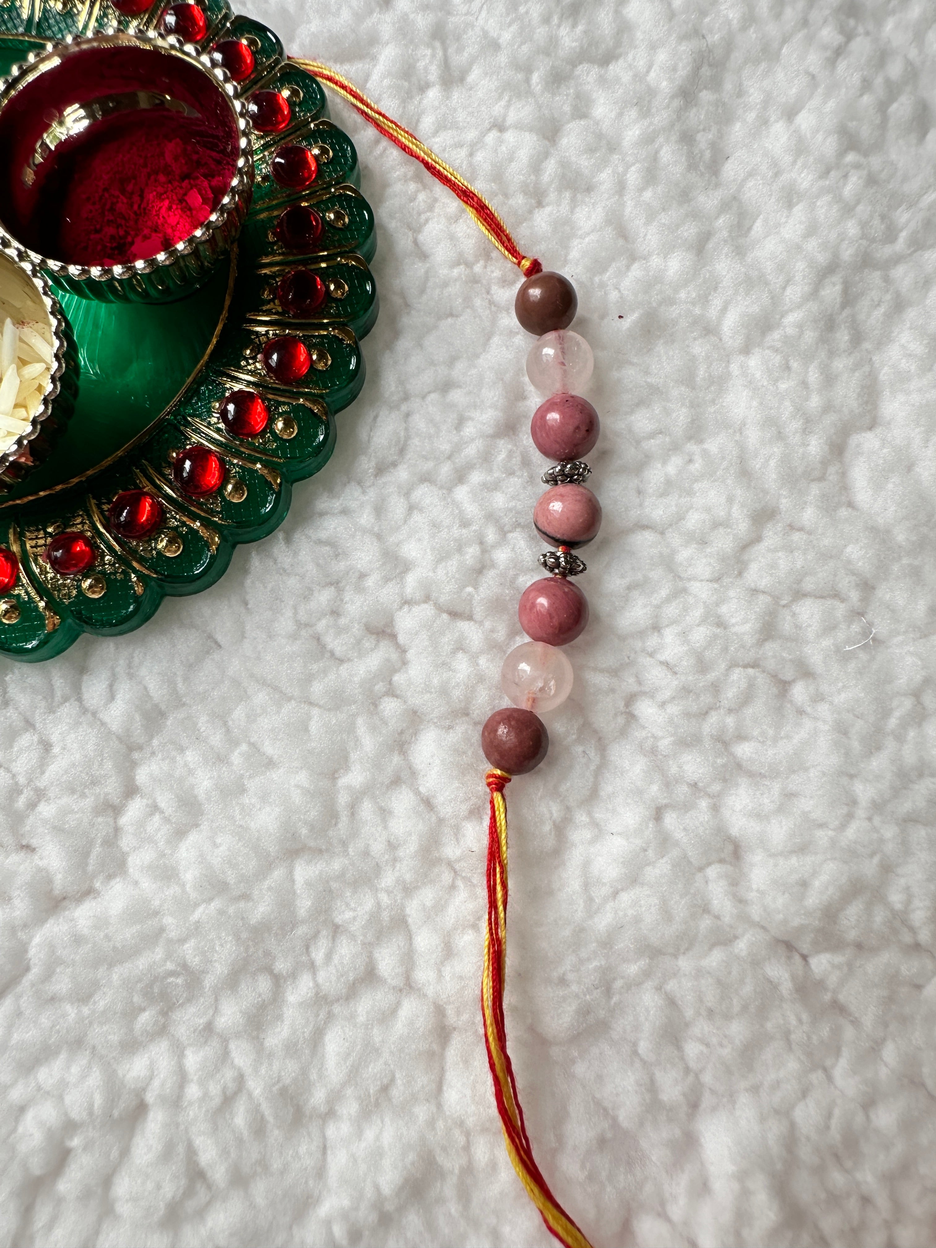 Handcrafted Rakhi with Rose Quartz & Rhodonite Beads