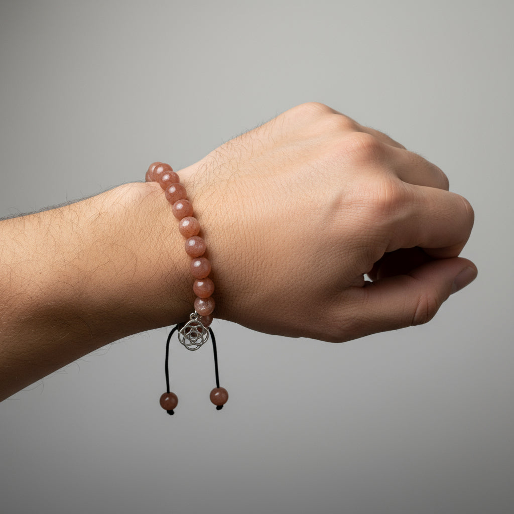 Bracelet activation ritual with sage, candle and moonstones