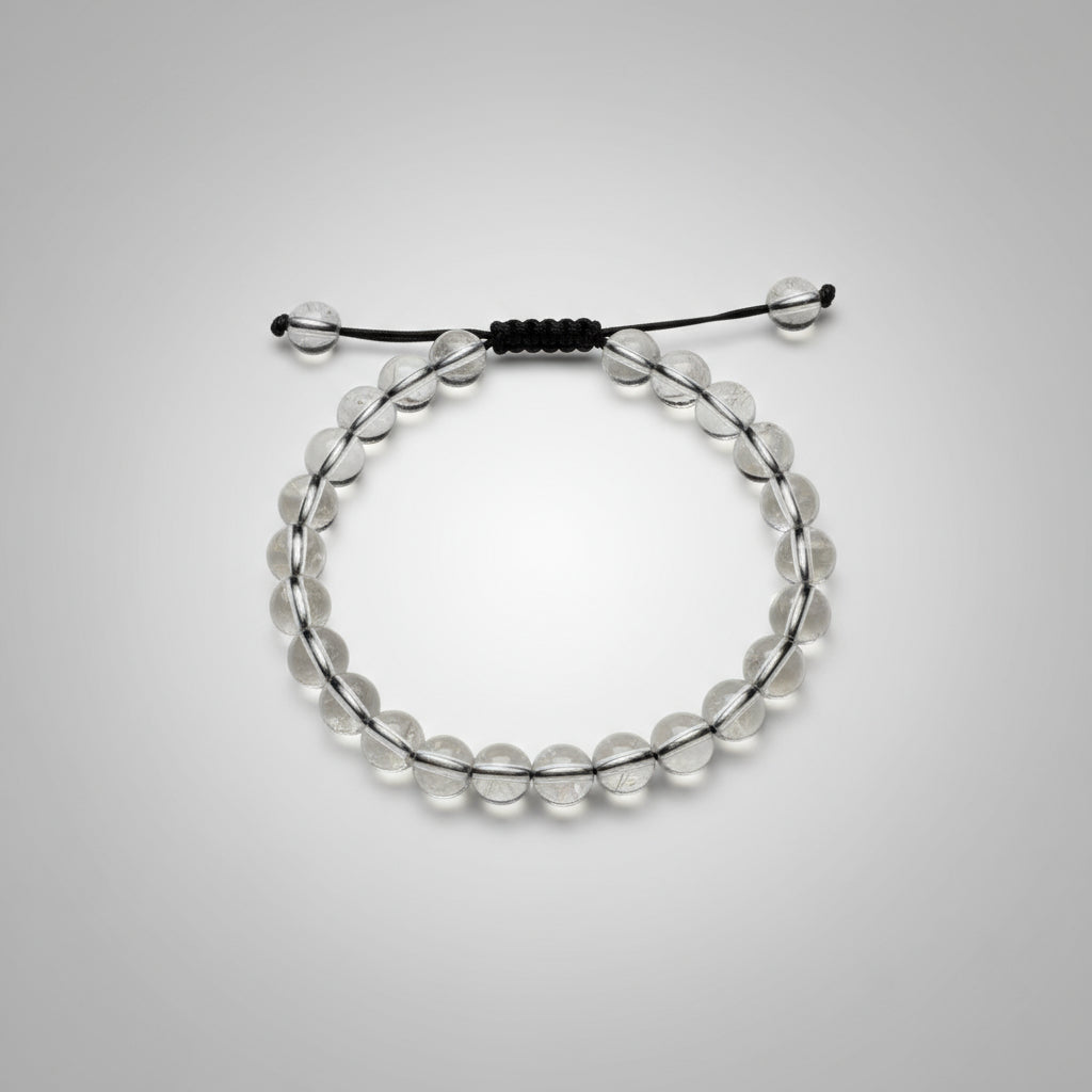 Bracelet activation ritual with sage, candle and moonstones