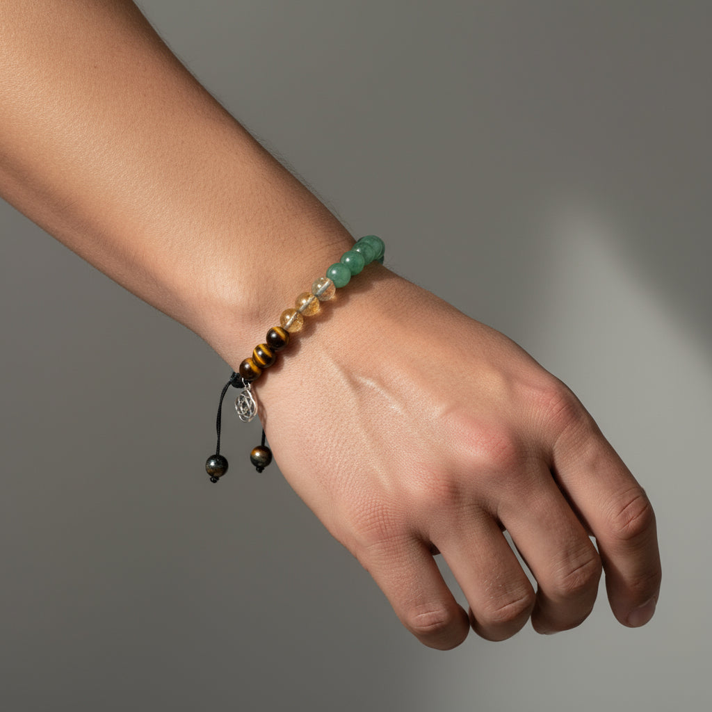 Bracelet activation ritual with sage, candle and moonstones
